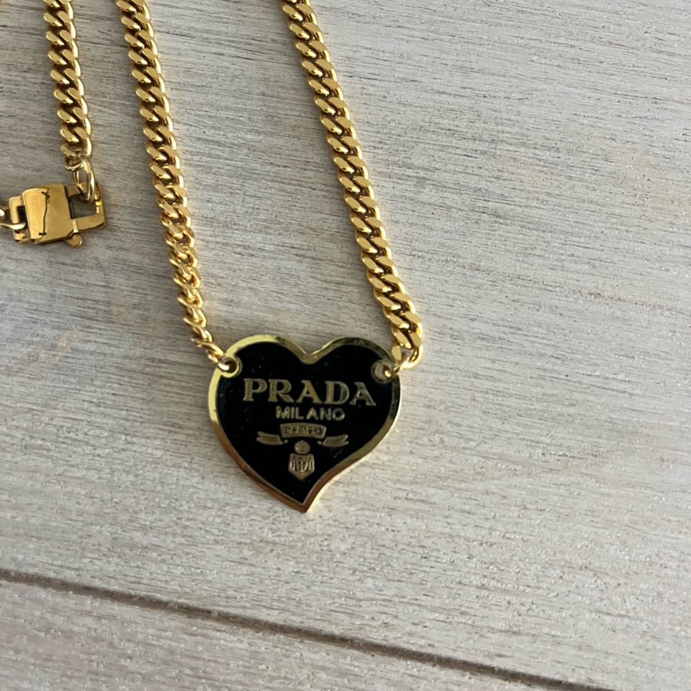 Prada Gold and Black Heart Necklace